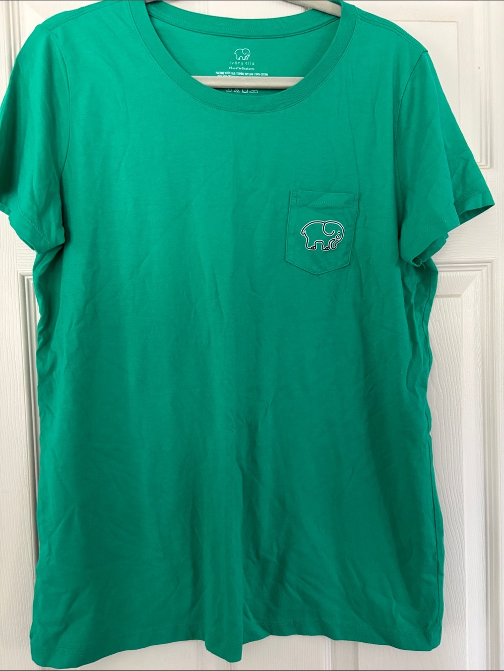 ivory ella teal pocket tee with elephant logo - Virgo